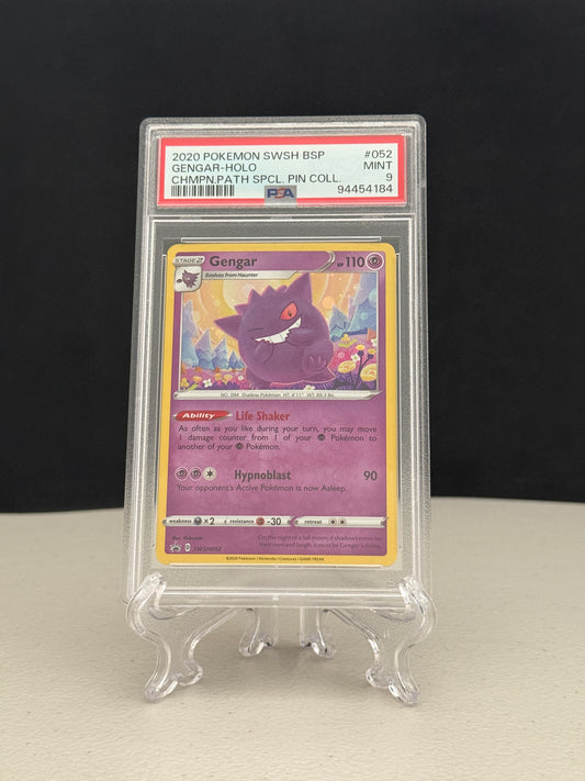 Trading card in a protective case on a black and white background